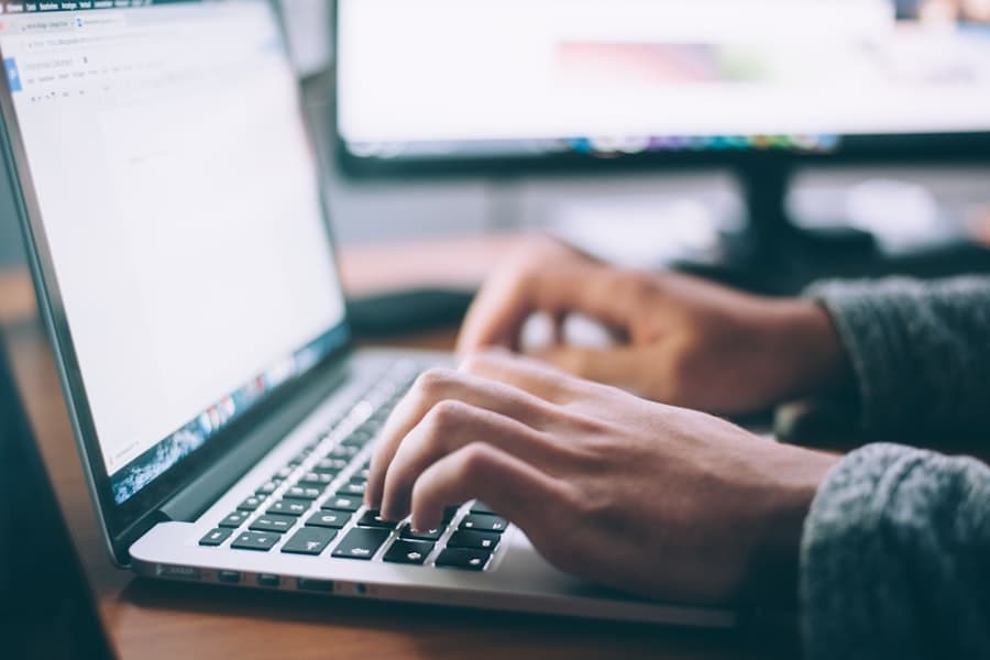 Guest booking a stay on a laptop